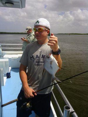 boy caught a Pompano