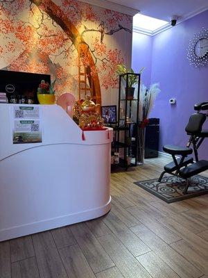 Reception desk and chair massage