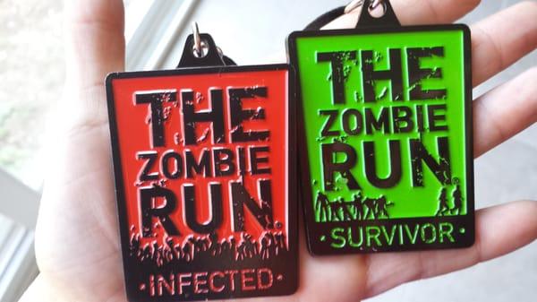 Hubby's ''infected'' Zombie Runner medal and My ''Survivor'' medal. Woohooo. Suck it Zombies, you can't get me!