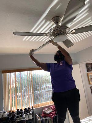 Staff cleaning customers house