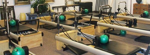 pilates studio with pilates reformer machines