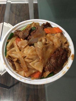 Beef with flat noodles. Actually really good! Noodles were well cooked, tons of beef so tender and seasoned perfectly. 5/5.