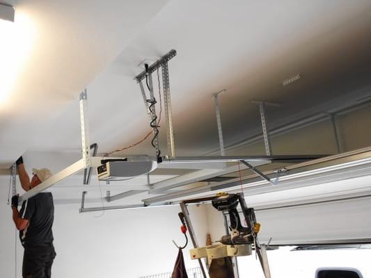 A one man job: 3 - 4x8 Garage Overhead Storage Racks