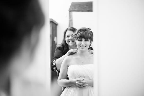 Candid moment between mother and bride