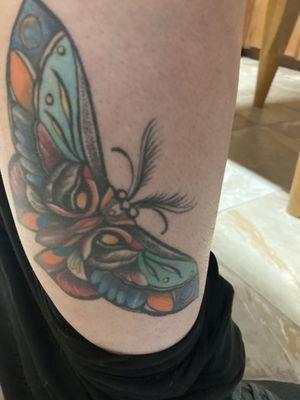 Rean did a beautiful clean moth of butterfly tattoo.