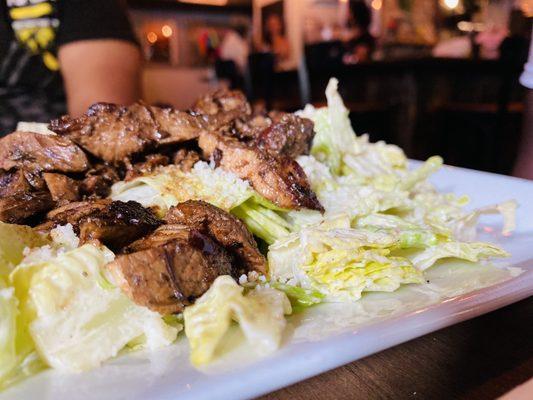 The Jerk Chicken Caesar Salad. A must-have be sure to take some of their wonderful food to go