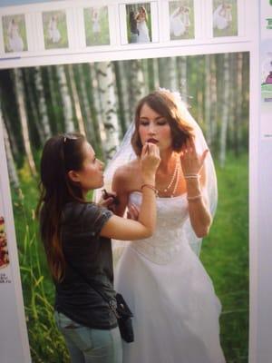 Irina is touching up bride's makeup in Siberia!