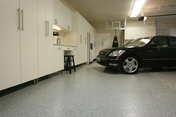 Epoxy Garage Flooring St. Louis MO. Call us at (636) 256-6733 or visit http://www.decorativeconcreteresurfacing.com/services/garage-floors/