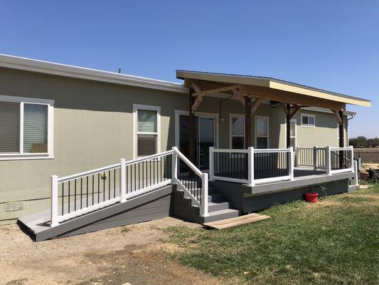 Custom-built Trex deck with overhang in Tracy