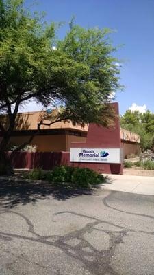 What can be seen from 1st Ave. Library is also where there is a pedestrian crosswalk with overhead flashing lights.