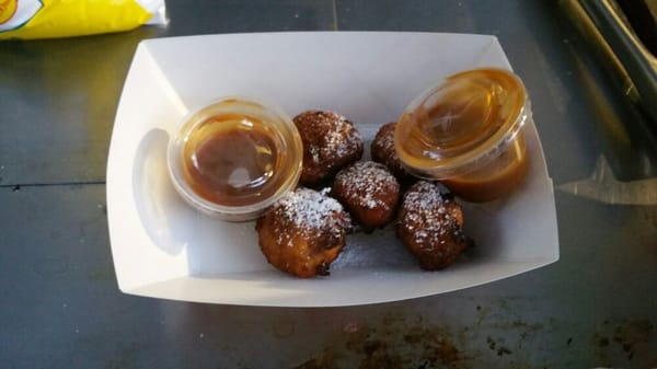 Dessert tater tots- sweet potato tater tots dusted with powdered sugar with a side of caramel dipping sauce.