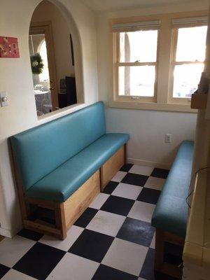 A retro-style seat and back upholstered in vinyl for a client's breakfast nook.