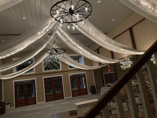 Beautiful white fabric with lights inside the venue