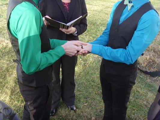 Two happy grooms eloped in a small backyard wedding with A Simple Ceremony officiating.