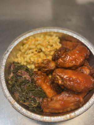 Hot wings with a side of Mac and greens