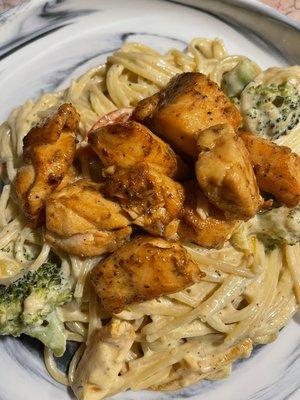 Salmon with peppers and broccoli cream sauce pasta