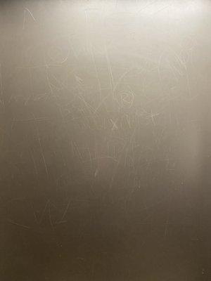 Elevator has graffiti