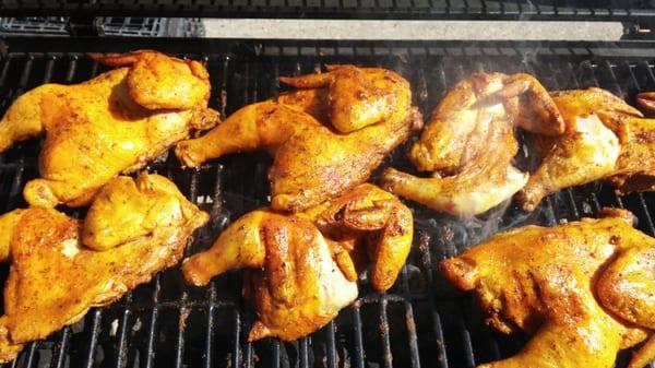 Half a chicken on the grill $5 bucks or you can turn it into a dinner for $8.75 and get your choice of 2 sides.