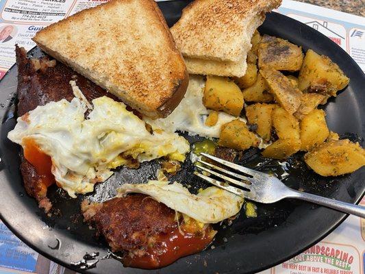 Two Egg Breakfast with Corned beef hash, homefries, toast.