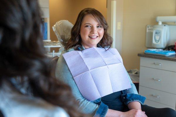 Patient smiling at Rochester endodontics