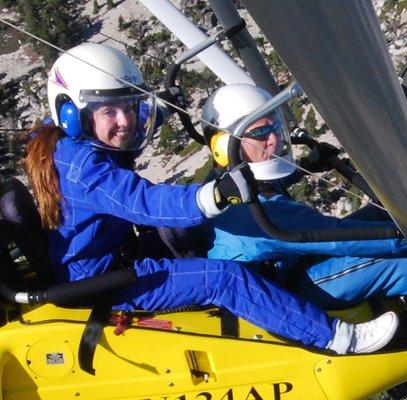 Big smiles and lots of fun at the controls of her own powered hang glider! - Hang Gliding Tahoe