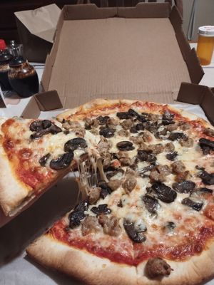 Medium sausage and mushroom pizza