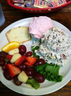 Pecan chicken salad plate.  Comes with fresh fruit, tiny slice of lemon tea bread, and frozen fruit delite