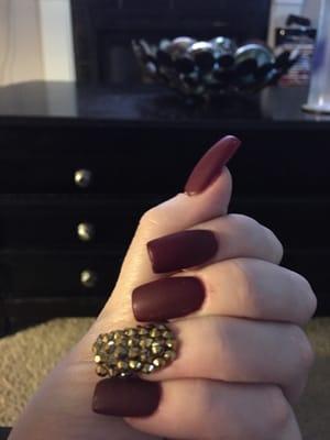 OPI color with matte polish and gold spikes!