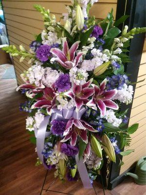 Tender Touch Standing Spray floral arrangement for my Aunt's services at the funeral home and the church.