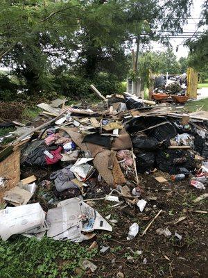 We clean up illegal dump sites on your property.