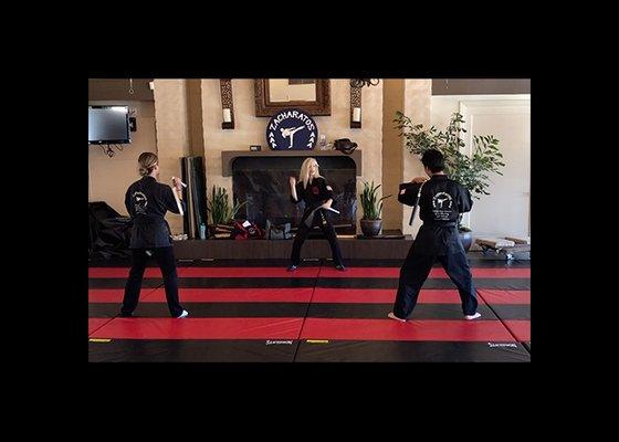 Zacharatos Karate weapons class, instructor Jamie BenAziz-Zacharatos, Nico Zacharatos,  Ewan McColl, with Nunchaku