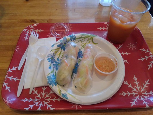 Plastic plates. Meatless spring rolls. Vinegar dip sans flavor. Thai tea that tastes like it's from a box. All in all: Yuck.