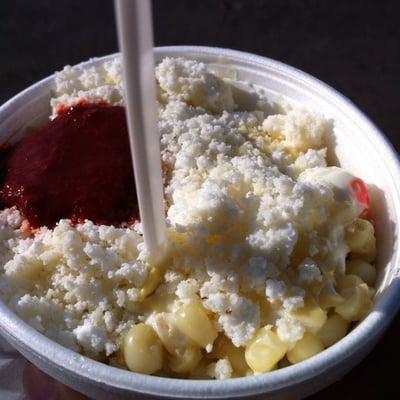 Corn in a cup. It has white corn, crumble cheese, mayo and chilito.