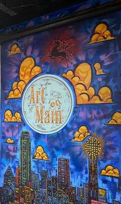 Art on Main mural created by artist Alec DeJesus.