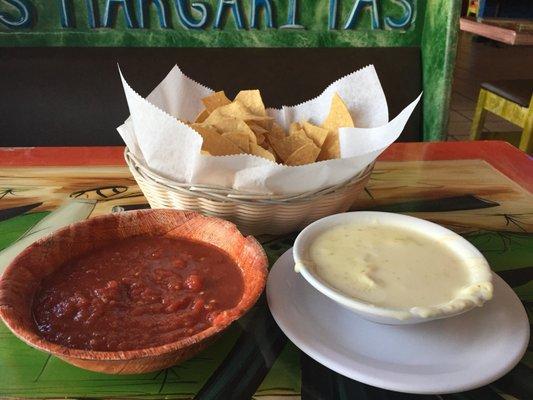 Chips, salsa, and white cheese sausage