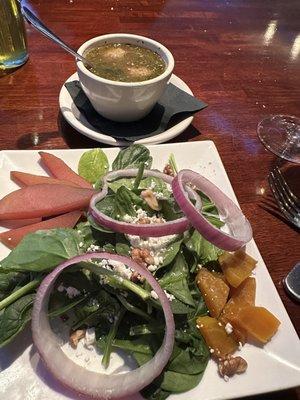 Goat cheese, beat and wine soaked pear spinach salad