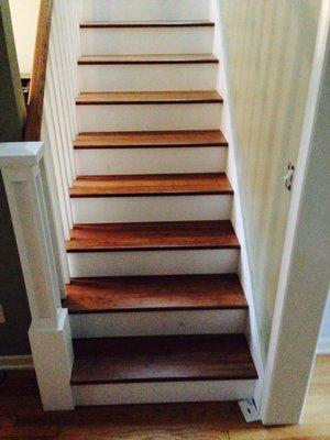 Custom stair treads: carbonized strand bamboo with glossy white risers