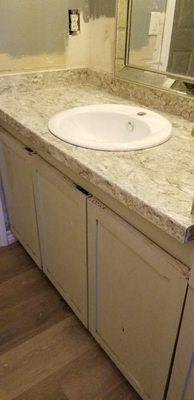 Bathroom counter. We chose to get a backsplash because the walls were so out of plumb and it is also a very small counter (splashes).