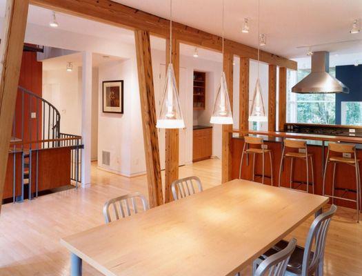 Contemporary remodel with open floor plan with exposed wooded beams- kitchen