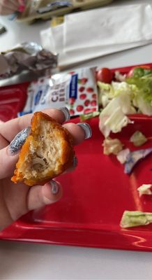 this is supposed to be a "chicken nugget" it looks like a ball sack and tastes like one too . is this imported chicken from china? probably.