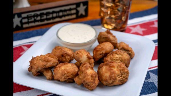 Hand breaded, deep fried mushrooms served with homemade ranch dressing.