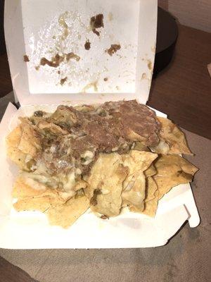 Nachos seemed to  purposely put in the container of side down. They were  smooshed by being at the  bottom of bag