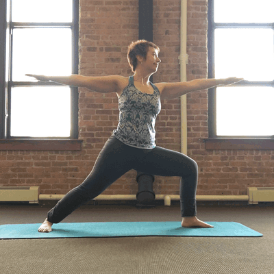 Cynthia Akey performing yoga - Warrior 2