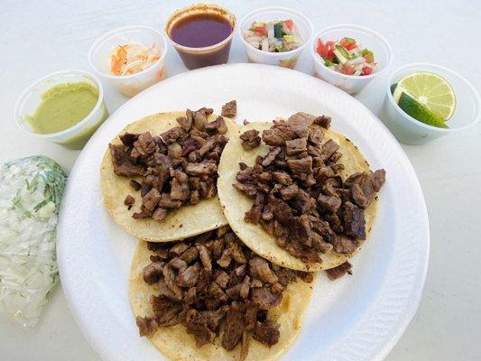 Three asada tacos = $9.00