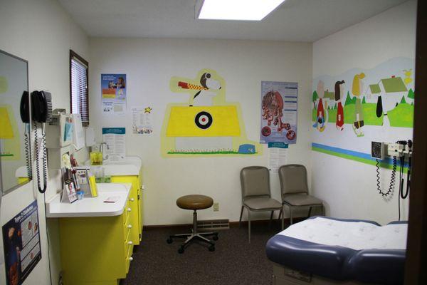 Handicap accessible children's specialty room with peanuts mural