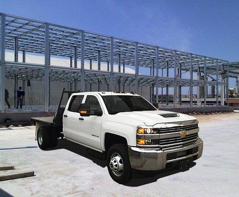 3500HD Chevy Silverado Duelly Crew Cab Flatbed equipped with Towing Package and Gooseneck for towing.