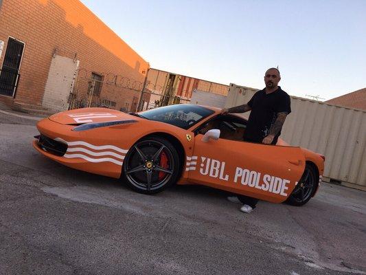 Wrapped in 3M matte orange with white graphics for JBL commercial, done in one day!