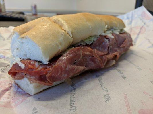 #9 Italian Night Club. Genoa salami, capicola, ham, provolone, lettuce, tomato, onions, mayo & vinaigrette. $7.41 before tip.