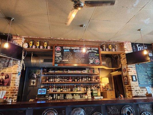 Great bourbon selection.  Good beer selection.  Burgers are phenomenal!   You won't find better burger in or around Charleston.