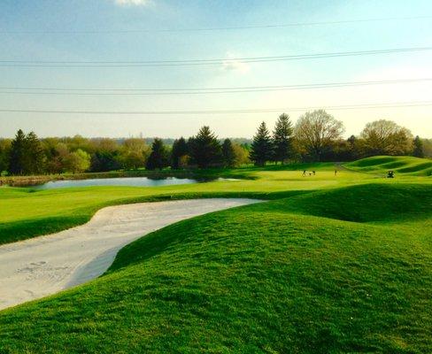 The downhill hole #8 with water guarding the green.